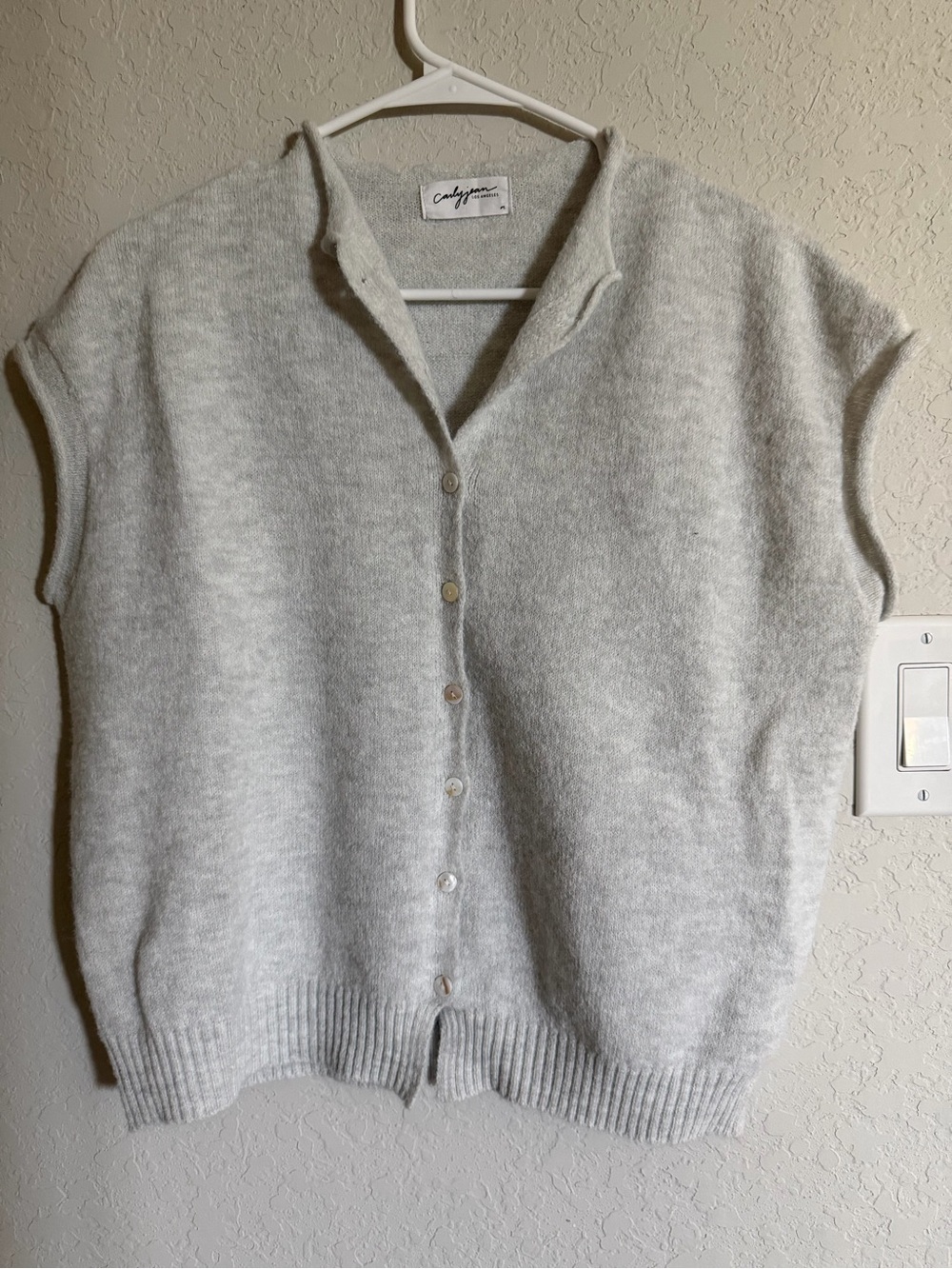 Carly Jean Los Angeles Light Gray Sleeveless Button Cardigan